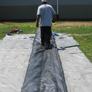 Preparing an Inflatable to be rolled